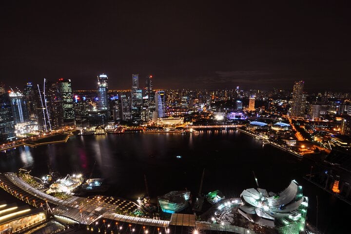 Nighttime Singapore skyline viewed from the Marina Bay Sands SkyPark
